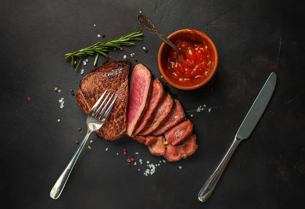 Sliced Fresh Beef Steak Served Tomato Sauce Rosemary Twig Stone — Stock Photo, Image