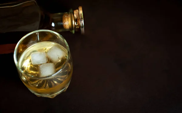 Glass Whiskey Ice Cubes Whiskey Bottle Black Background — Stock Photo, Image