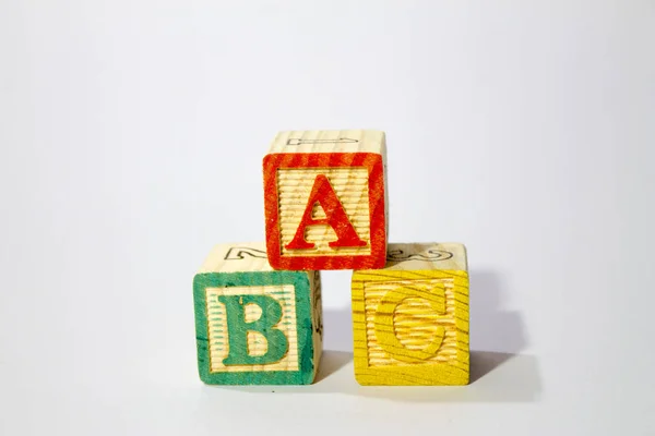 Wooden Alphabet Blocks spell ABC use for kids to learn Alphabet.