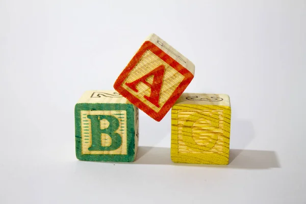 Wooden Alphabet Blocks spell ABC for kids.