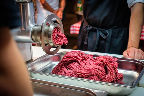 Hamburger meat freshly minced by a meat grinder — Stock Photo, Image