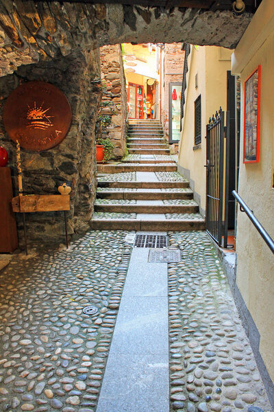 Old narrow street on the island of Isola Bella on lake Maggiore, Italy