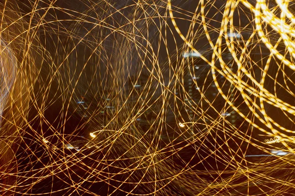 Abstract light streaks in the night sky