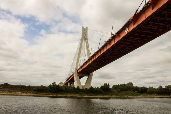 Cable-stayed bridge in Murom Russia across the Oka river on a summer cloudy day