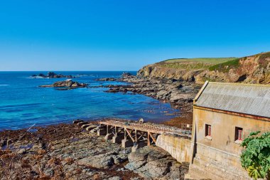 Polpeor Cove, kertenkele, Cornwall cankurtaran istasyonunda. Bu kertenkele üçüncü cankurtaran istasyonunda oldu. İn1914 açılabilir ve 1961 yılında kapalı.