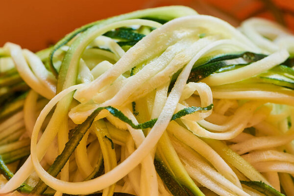 Macro color photo of zucchini noodles (zoodles)