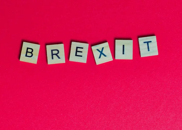 Ord "brexit" på rød bakgrunn – stockfoto