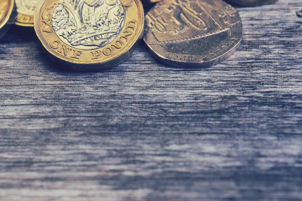 Arka plan resmi olarak 1 pound İngiliz parası yakın plan