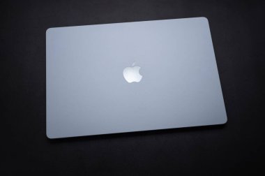 Mainz, Germany - September 07, 2025: MacBook Air with M4 chip resting on a dark surface 