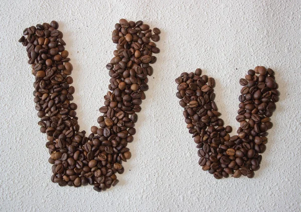 Imagem Grãos Café Torrados Forma Alfabeto Fundo Branco — Fotografia de Stock