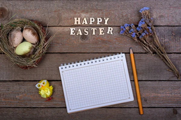 Easter background. The inscription of the wooden letters \