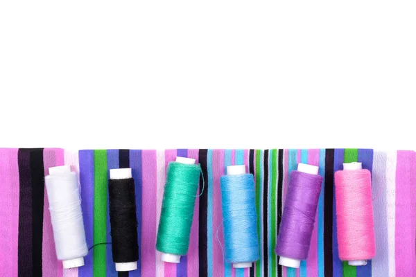 Sewing Background Striped Fabric Spools Threads Different Colors White Background — Stock Photo, Image