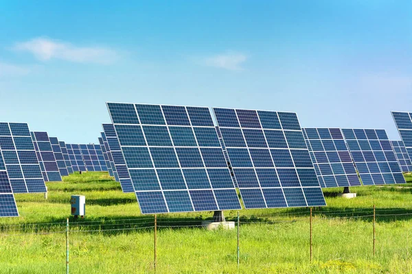Solar station. Field with solar panels for the production of natural solar energy. Green electricity. Place for text, copy space, web banner, banner, advertisement.