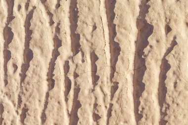 Dekoratif Stucco 'nun Sarı Dalgalı Soyut Dokusunun Yakın Çekim Macro Çekimi. Yatay Resim