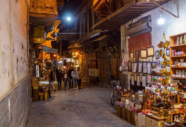 People hangouts in tradiational marketplace   in ancient City in Damascus, Syria on 22/12/2019
