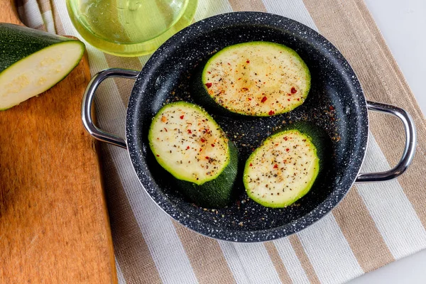 Zucchini snack in a small pan.