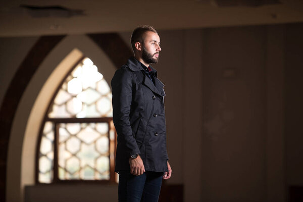 Portrait of a Adult Muslim Man Is Praying In The Mosque