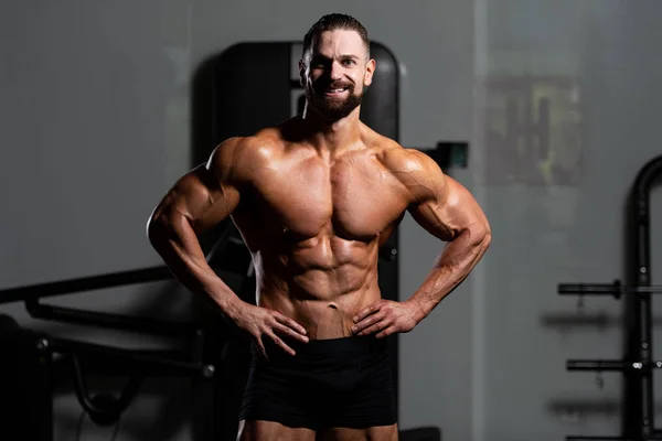 Young Man Standing Strong Gym Flexing Muscles Muscular Athletic Bodybuilder — Stock Photo, Image