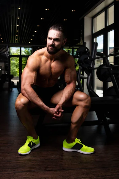 Handsome Good Looking And Attractive Young Man With Muscular Body Relaxing In Gym