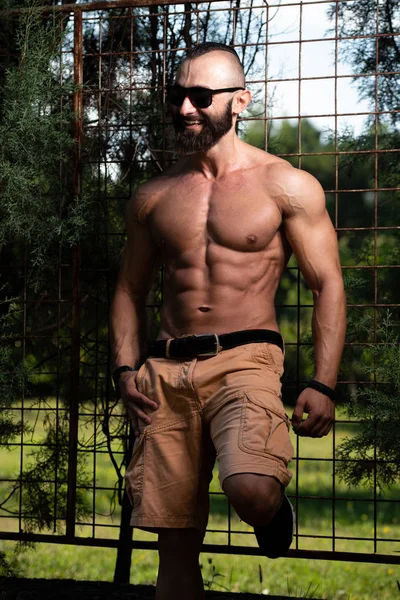 Handsome Young Model Standing Strong Outdoors Flexing Muscles Muscular Athletic — Stock Photo, Image
