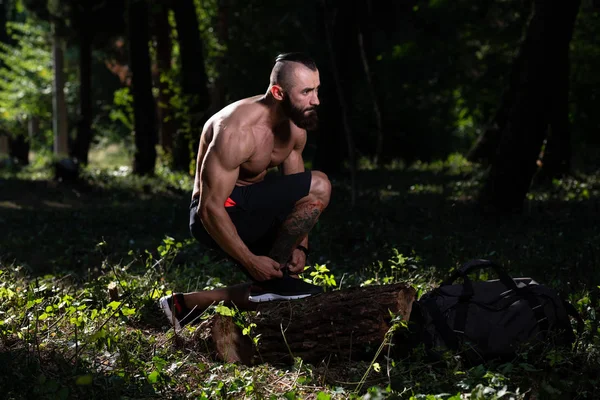 Male Athlete Getting Ready Tying Shoelaces Forest Running Park Doing — Stock Photo, Image