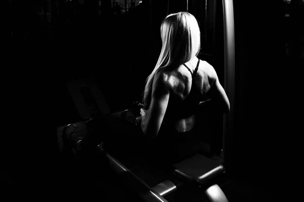 Fitness Woman Working Out Back Machine Fitness Center — Stock Photo, Image