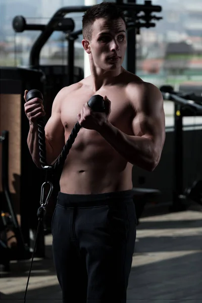 Muscular Fitness Bodybuilder Doing Heavy Weight Exercise Biceps Machine Cable — Stock Photo, Image