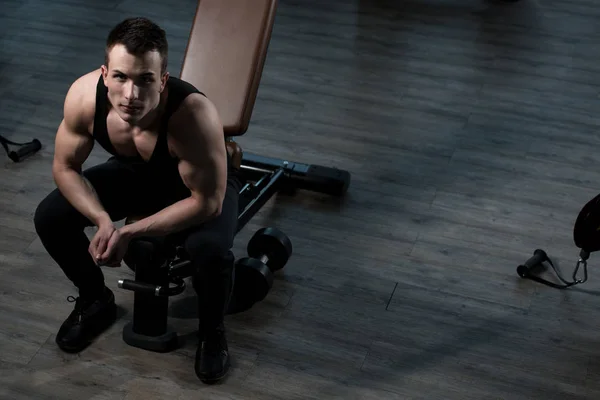 Handsome Good Looking And Attractive Young Man With Muscular Body Relaxing In Gym