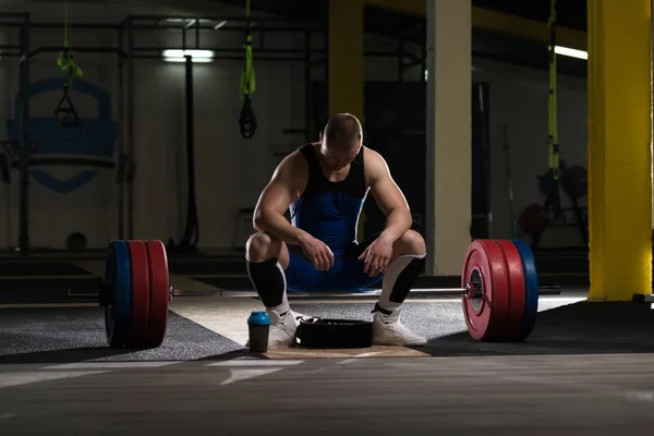 Handsome Good Looking And Attractive Young Man With Muscular Body Relaxing In Gym