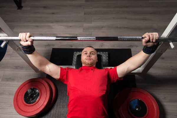 Professional Athlete Lying Holding Very Heavy Barbell — Stock Photo, Image