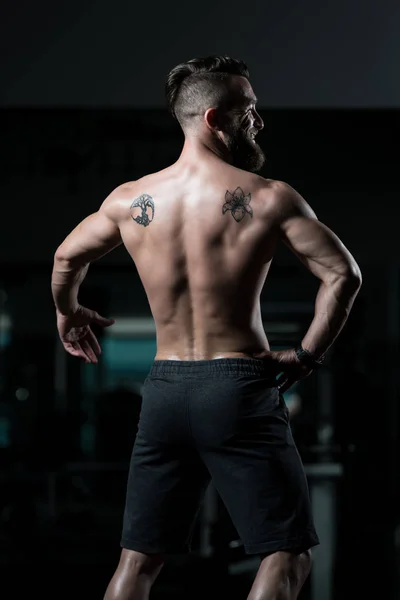 Handsome Young Man Standing Strong Gym Flexing Muscles Muscular Athletic — Stock Photo, Image