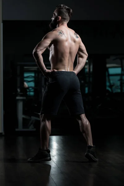 Handsome Young Man Standing Strong Gym Flexing Muscles Muscular Athletic — Stock Photo, Image