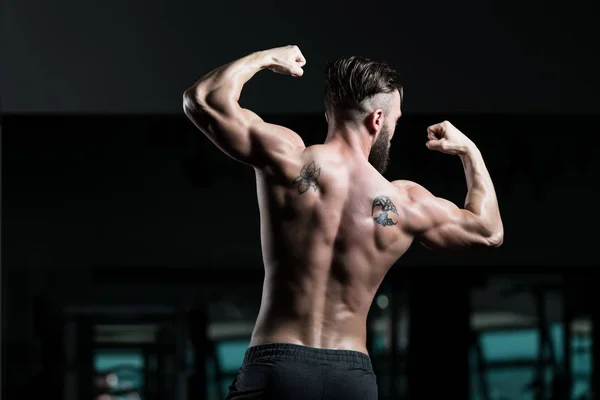 Handsome Young Man Standing Strong Gym Flexing Muscles Muscular Athletic — Stok Foto