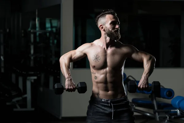 Man Working Out Shoulders Dumbbells Gym — Stock Photo, Image