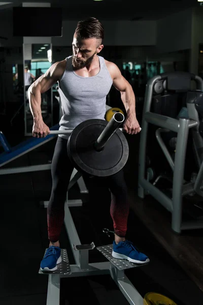 Handsome Bodybuilder Doing Heavy Weight Exercise Back Machine Weights — Stock Photo, Image