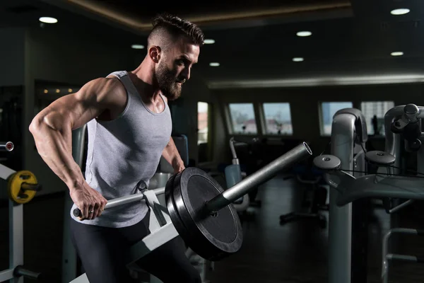 Handsome Bodybuilder Doing Heavy Weight Exercise Back Machine Weights — Stock Photo, Image