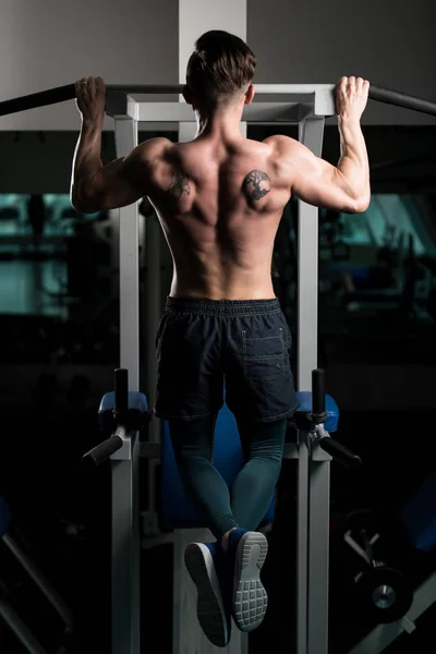 Handsome Bodybuilder Doing Heavy Weight Exercise Back Machine — Stock Photo, Image