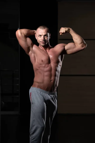 Handsome Young Man Standing Strong Gym Flexing Muscles Muscular Athletic — Stock Photo, Image