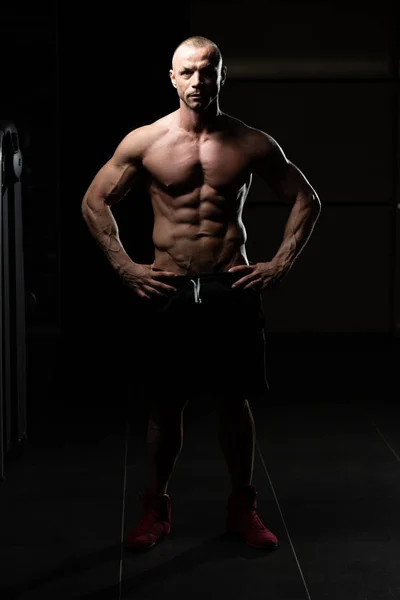 Handsome Young Man Standing Strong Gym Flexing Muscles Muscular Athletic — Stock Photo, Image