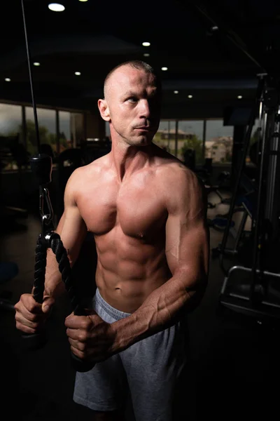 Muscular Fitness Bodybuilder Doing Heavy Weight Exercise Triceps Machine Cable — Stock Photo, Image