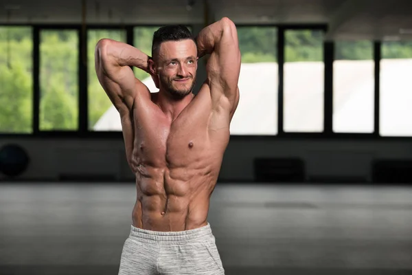 Young Man Standing Strong Gym Flexing Muscles Muscular Athletic Bodybuilder — Stock Photo, Image