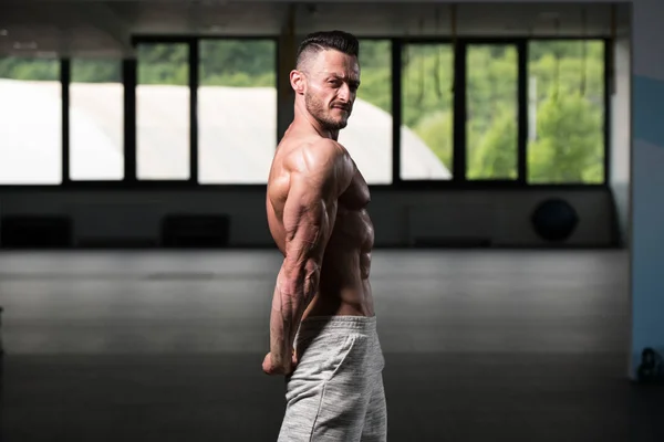 Young Man Standing Strong Gym Flexing Muscles Muscular Athletic Bodybuilder — Stock Photo, Image