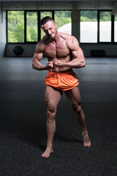 Young Man Standing Strong Gym Flexing Muscles Muscular Athletic Bodybuilder — Stock Photo, Image