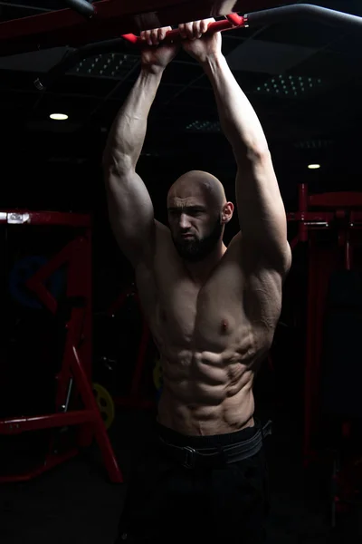 Handsome Man Flexing Muscles — Stock Photo, Image