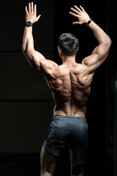 Young Bodybuilder Flexing Back Pose — Stok Foto