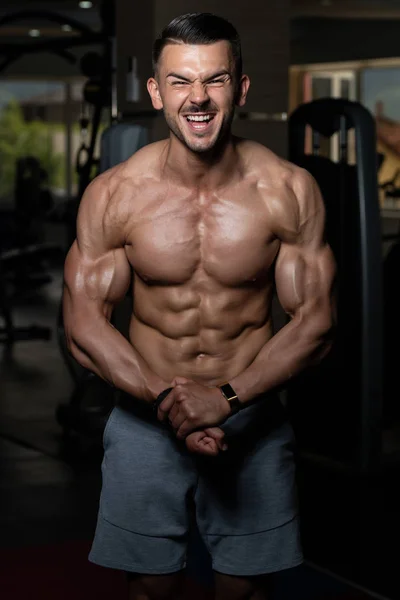 Young Man Showing Abdominal Muscle — Stock Photo, Image