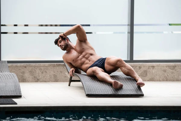 Young Athlete Resting On Sun Lounger — Stock Photo, Image