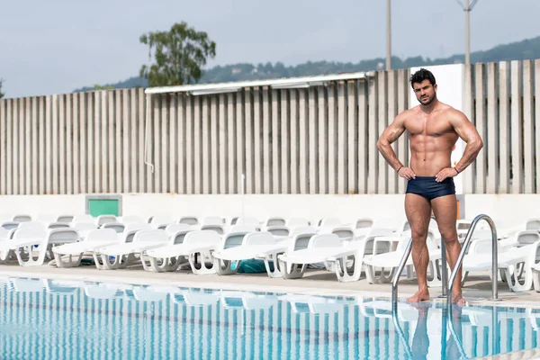 Young Muscular Man At Swimming Outdoor Pool — Stock Photo, Image