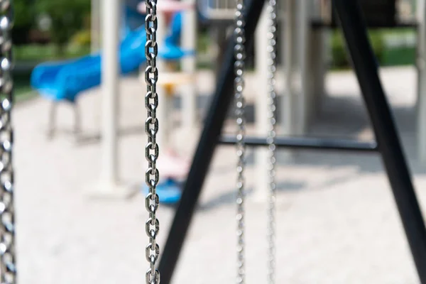 Playground Swing in a Park — Stock Photo, Image