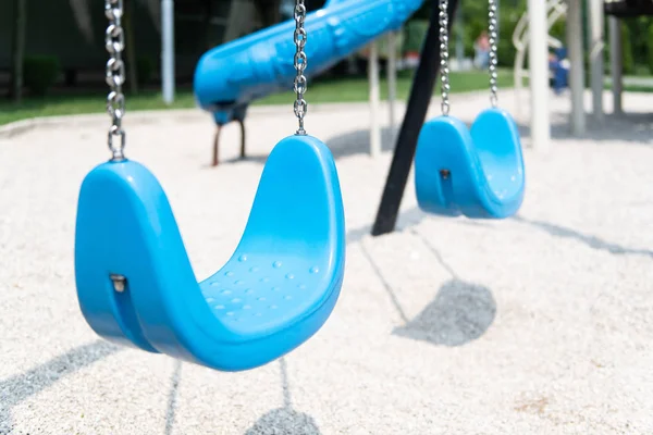 Empty Swings on the Children's Playground — Stock Photo, Image